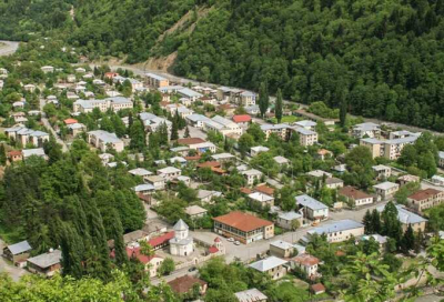 A former mayor has been taken into custody in Georgia in connection with a hotel permit given to a business owned by his wife